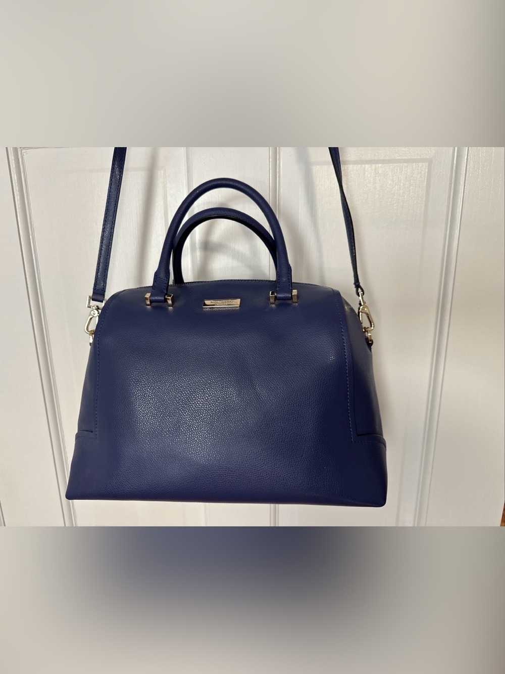 kate spade New York navy blue leather with gold plaque duffle with crossbody